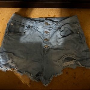 High waisted button up pair of shorts
